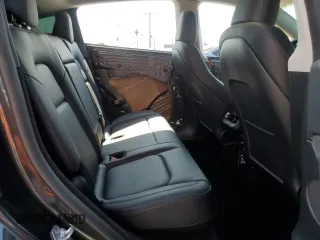 2024 Tesla Model Y Long Range z VIN 7SAYGDEE0RF024326, wystawiony jako Copart lot #52149675 z przebiegiem 34 503 mil mil oraz Szkoda całkowita • Salvage title. Historia ofert i sprzedaży dostępna na DreamBid. Obrazek 11.