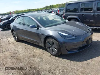 2023 Tesla Model 3 with VIN 5YJ3E1EA3PF686679, listed as a IAAI auction lot 42240380 with 20,512 mi miles and . Bid and sale history available at DreamBid. Image 1.
