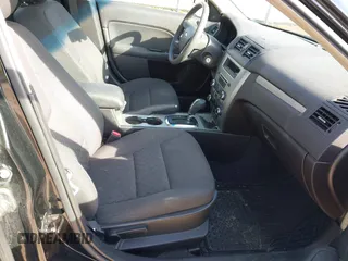 2011 Ford Fusion SE with VIN 3FAHP0HA3BR278427, listed as a IAAI auction lot 41771864 with 115,114 mi miles. Bid and sale history available at carsss.com. Image 5.