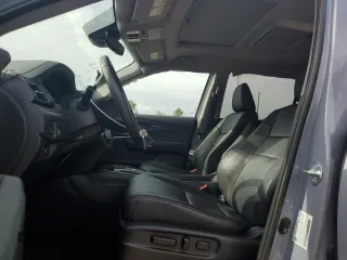 2022 Honda Pilot Touring 7-Passenger z VIN 5FNYF5H69NB031540, wystawiony jako Copart lot #51661185 z przebiegiem 58 316 mil mil oraz Szkoda całkowita • Salvage title. Historia ofert i sprzedaży dostępna na DreamBid. Obrazek 7.