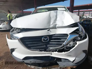 2016 Mazda CX-9 Sport with VIN JM3TCBBY0G0117159, listed as a IAAI auction lot 41302108 with 136,495 mi miles. Bid and sale history available at carsss.com. Image 12.