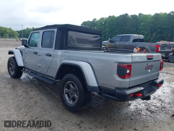 2020 Jeep Gladiator Rubicon z VIN 1C6JJTBG7LL181833, wystawiony jako IAAI lot #42493073 z przebiegiem 13 775 mil mil oraz . Historia ofert i sprzedaży dostępna na DreamBid. Obrazek 3.