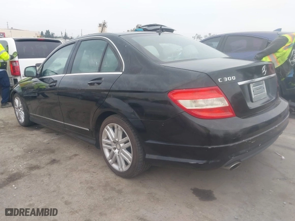 2009 Mercedes-Benz C-Class 3.0L Sport with VIN WDDGF54X19F207143, listed as a IAAI auction lot 41718227 with 128,147 mi miles. Bid and sale history available at carsss.com. Image 3.