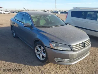 2015 Volkswagen Passat 1.8T S with VIN 1VWAT7A38FC117925, listed as a IAAI auction lot 41658941 with 198,710 mi miles. Bid and sale history available at carsss.com. Image 1.
