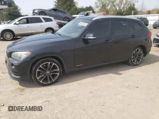 2015 BMW X1 xDrive28i with VIN WBAVL1C53FVY37408, listed as a Copart auction lot 53092995 with 105,195 mi miles and Salvage Title. Bid and sale history available at carsss.com. Image 1.