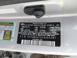 2012 Kia Optima LX with VIN 5XXGM4A7XCG063387, listed as a IAAI auction lot 42087129 with 180,585 mi miles and . Bid and sale history available at carsss.com. Image 9.
