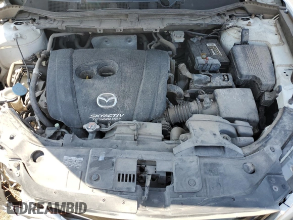 2014 Mazda CX-5 Touring with VIN JM3KE2CY9E0305244, listed as a Copart auction lot 56205605 with 164,516 mi miles and Salvage Title. Bid and sale history available at DreamBid. Image 12.