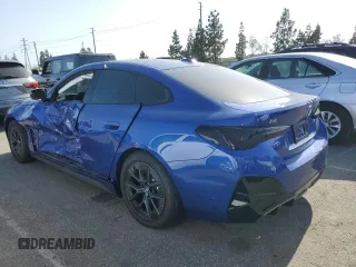 2024 BMW i4 M50 with VIN WBY33AW07RFS19600, listed as a Copart auction lot 53030904 with 1,985 mi miles and Salvage Title. Bid and sale history available at carsss.com. Image 2.