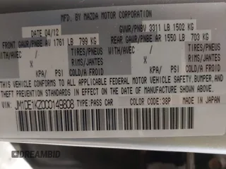 2012 Mazda 2 Sport with VIN JM1DE1KZ0C0149808, listed as a IAAI auction lot 42233078 with 166,111 mi miles and . Bid and sale history available at DreamBid. Image 9.
