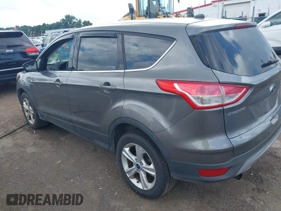 2013 Ford Escape SE with VIN 1FMCU9G95DUC01185, listed as a IAAI auction lot 42602840 with 140,697 mi miles and . Bid and sale history available at DreamBid. Image 3.