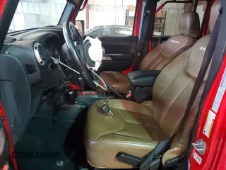2016 Jeep Wrangler Unlimited Sahara z VIN 1C4BJWEG9GL219739, wystawiony jako Copart lot #59686315 z przebiegiem 59 242 mil mil oraz Szkoda całkowita • Salvage title. Historia ofert i sprzedaży dostępna na DreamBid. Obrazek 7.