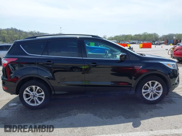 2017 Ford Escape SE with VIN 1FMCU9GD4HUE72510, listed as a IAAI auction lot 41932364 with 115,991 mi miles. Bid and sale history available at carsss.com. Image 13.