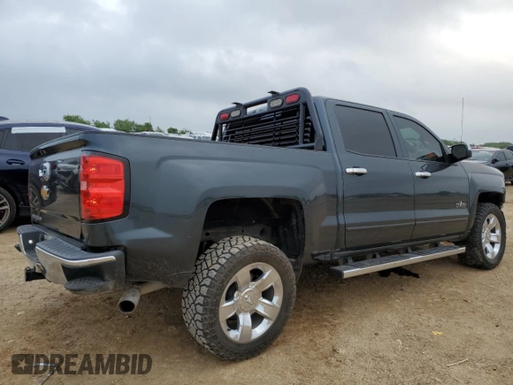 2017 Chevrolet Silverado 1500 LT with VIN 1GCVKREC1HZ358108, listed as a Copart auction lot 54354655 with 135,894 mi miles and Salvage Title. Bid and sale history available at DreamBid. Image 3.