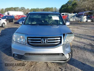 2015 Honda Pilot EX-L with VIN 5FNYF4H57FB006655, listed as a IAAI auction lot 41822385 with 125,915 mi miles and . Bid and sale history available at carsss.com. Image 11.
