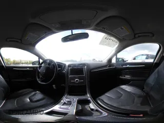 2017 Ford Fusion Titanium with VIN 3FA6P0K90HR266556, listed as a IAAI auction lot 41947924 with 135,628 mi miles. Bid and sale history available at carsss.com. Image 19.