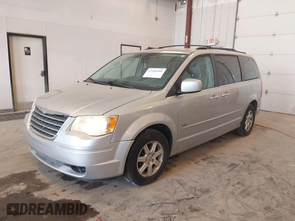 2008 Chrysler Town & Country Touring z VIN 2A8HR54P58R840654, wystawiony jako IAAI lot #42480988 z przebiegiem 132 540 mil mil oraz . Historia ofert i sprzedaży dostępna na DreamBid. Obrazek 2.