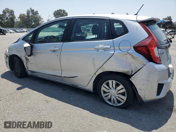 2015 Honda Fit LX with VIN 3HGGK5H55FM748370, listed as a Copart auction lot 61524455 with 87,235 mi miles and Salvage title. Bid and sale history available at DreamBid. Image 2.