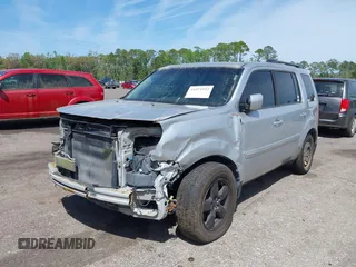 2011 Honda Pilot EX-L with VIN 5FNYF4H60BB096041, listed as a IAAI auction lot 41971952 with 165,868 mi miles and . Bid and sale history available at carsss.com. Image 17.