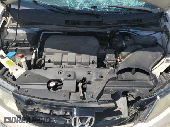2015 Honda Odyssey LX with VIN 5FNRL5H27FB054746, listed as a Copart auction lot 53023405 with 96,548 mi miles and Salvage Title. Bid and sale history available at DreamBid. Image 13.