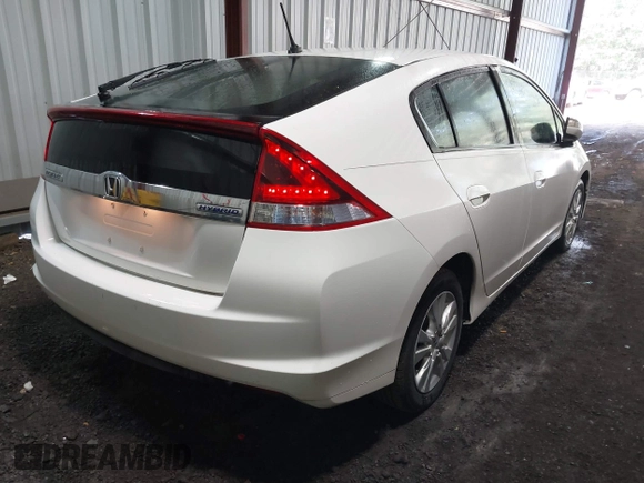 2012 Honda Insight EX with VIN JHMZE2H71CS003132, listed as a IAAI auction lot 42582548 with 112,593 mi miles and . Bid and sale history available at DreamBid. Image 4.
