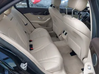 2016 Mercedes-Benz C-Class C 300 Luxury with VIN 55SWF4KB0GU150456, listed as a IAAI auction lot 41920406 with 124,371 mi miles. Bid and sale history available at carsss.com. Image 8.