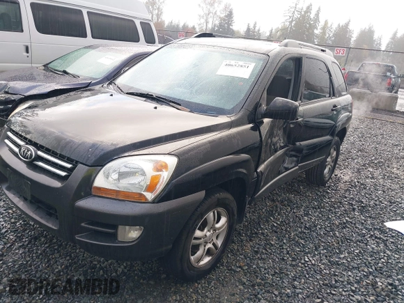 2005 Kia Sportage LX with VIN KNDJF723557054234, listed as a IAAI auction lot 40652851 with 220,215 mi miles and . Bid and sale history available at carsss.com. Image 17.