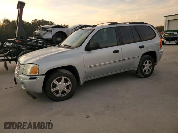 2008 GMC Envoy SLE1 with VIN 1GKDS13S282122684, listed as a Copart auction lot 80488104 with 262,167 mi miles and Salvage Title. Bid and sale history available at DreamBid. Image 1.