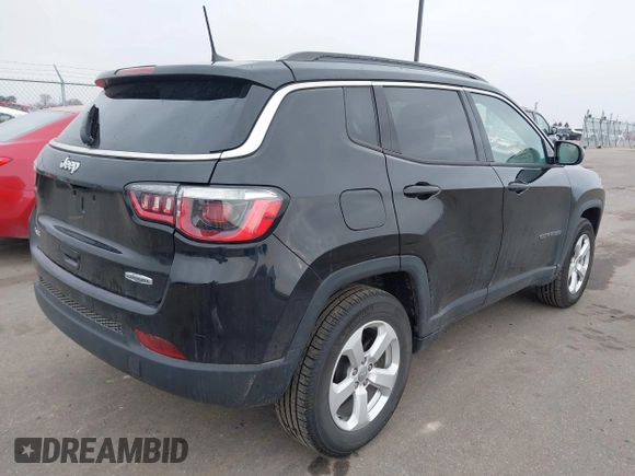 2018 Jeep Compass Altitude with VIN 3C4NJDBB9JT202297, listed as a IAAI auction lot 42020996 with 59,461 mi miles and . Bid and sale history available at DreamBid. Image 4.