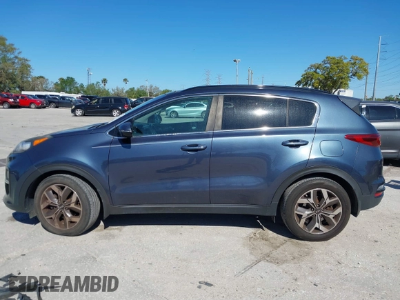2020 Kia Sportage EX z VIN KNDPN3AC7L7781783, wystawiony jako IAAI lot #41739626 z przebiegiem 103 413 mil mil oraz . Historia ofert i sprzedaży dostępna na DreamBid. Obrazek 14.