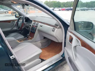 2002 Mercedes-Benz E-Class with VIN WDBJH65J12B462834, listed as a IAAI auction lot 42086848 with 190,720 mi miles. Bid and sale history available at carsss.com. Image 5.