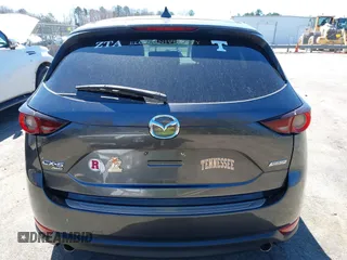 2017 Mazda CX-5 Touring with VIN JM3KFBCL2H0203497, listed as a IAAI auction lot 41860782 with 65,482 mi miles. Bid and sale history available at carsss.com. Image 16.