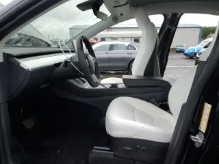 2022 Tesla Model Y Long Range z VIN 7SAYGDEE0NF327147, wystawiony jako Copart lot #58422885 z przebiegiem 39 021 mil mil oraz Szkody całkowita. Historia ofert i sprzedaży dostępna na DreamBid. Obrazek 7.