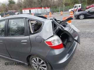 2013 Honda Fit Sport with VIN JHMGE8H56DC029276, listed as a IAAI auction lot 42002632 with 199,549 mi miles. Bid and sale history available at carsss.com. Image 20.