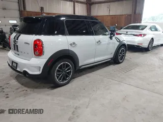 2016 MINI Countryman S with VIN WMWZC5C57GWU20085, listed as a IAAI auction lot 42403406 with 90,592 mi miles and . Bid and sale history available at DreamBid. Image 4.