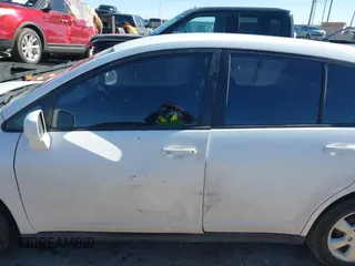 2009 Nissan Versa 1.8 SL with VIN 3N1BC13E89L410688, listed as a IAAI auction lot 41447457 with 182,807 mi miles. Bid and sale history available at carsss.com. Image 14.