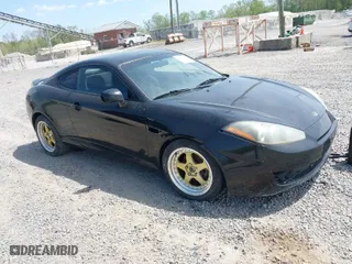 2007 Hyundai Tiburon GS with VIN KMHHM66D87U255336, listed as a IAAI auction lot 42035856 with 177,338 mi miles. Bid and sale history available at carsss.com. Image 1.