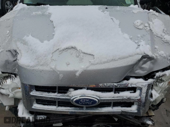 2010 Ford Escape XLS с VIN 1FMCU0C77AKD47899, выставлен на аукционе Copart как лот 45043535 с пробегом Не указан миль и Списание • Salvage title. История ставок и продаж доступна на DreamBid. Изображение 14.