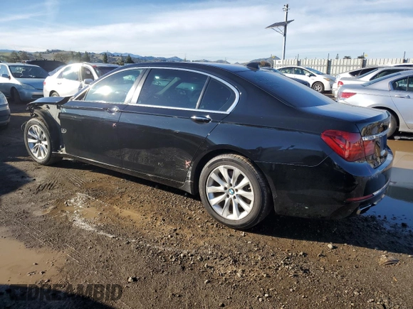 2015 BMW 7 Series 740Li with VIN WBAYE4C55FD947214, listed as a Copart auction lot 87261354 with 393,256 mi miles and Salvage Title. Bid and sale history available at DreamBid. Image 2.