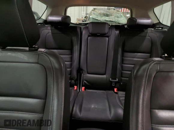 2019 Ford Escape Titanium with VIN 1FMCU9J94KUA02845, listed as a Copart auction lot 52096895 with 69,689 mi miles and Salvage Title. Bid and sale history available at carsss.com. Image 10.