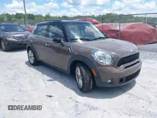2013 MINI Countryman S with VIN WMWZC3C59DWP24907, listed as a IAAI auction lot 42719063 with 64,138 mi miles and . Bid and sale history available at DreamBid. Image 1.