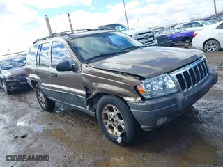 2001 Jeep Grand Cherokee Laredo with VIN 1J4GW48S21C572272, listed as a IAAI auction lot 41695754 with 169,229 mi miles. Bid and sale history available at carsss.com. Image 1.