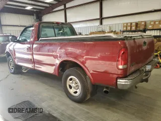 1999 Ford F-150 with VIN 1FTRF18W8XNB97257, listed as a Copart auction lot 87857815 with Not provided miles and Salvage title. Bid and sale history available at DreamBid. Image 2.