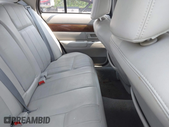 2004 Mercury Grand Marquis LS Premium z VIN 2MEFM75W04X634791, wystawiony jako IAAI lot #42482387 z przebiegiem 133 145 mil mil oraz . Historia ofert i sprzedaży dostępna na DreamBid. Obrazek 8.