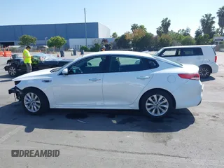 2018 Kia Optima LX z VIN 5XXGT4L35JG265371, wystawiony jako IAAI lot #42494354 z przebiegiem 86 411 mil mil oraz . Historia ofert i sprzedaży dostępna na DreamBid. Obrazek 15.