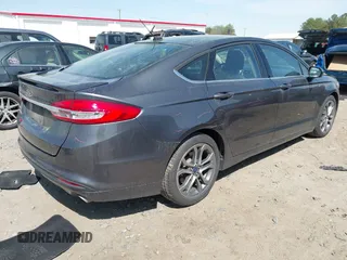 2017 Ford Fusion S with VIN 3FA6P0G73HR240251, listed as a IAAI auction lot 41940426 with 282,023 mi miles. Bid and sale history available at carsss.com. Image 4.