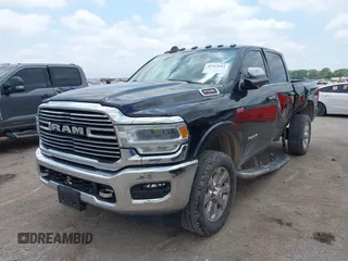 2022 Ram 2500 Laramie with VIN 3C6UR5FJ2NG305658, listed as a IAAI auction lot 42362662 with 50,701 mi miles and . Bid and sale history available at DreamBid. Image 17.