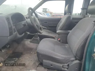 1996 Nissan Frontier XE with VIN 1N6SD16SXTC322219, listed as a Copart auction lot 49043685 with 102,964 mi miles and Salvage title. Bid and sale history available at DreamBid. Image 8.
