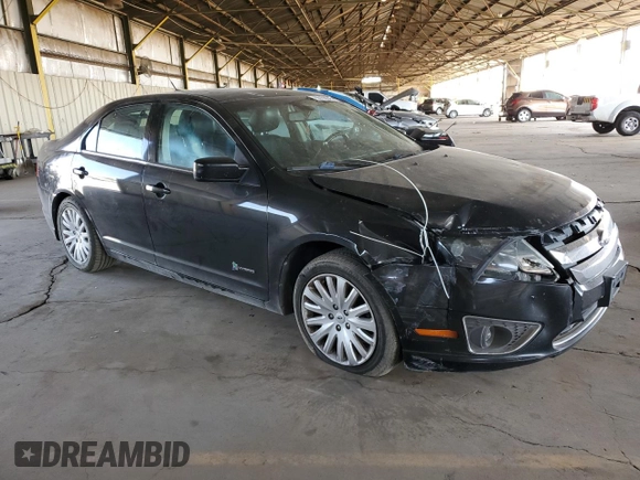 2012 Ford Fusion Hybrid с VIN 3FADP0L34CR416775, выставлен на аукционе Copart как лот 55108645 с пробегом 102 574 миль миль и Списание • Salvage title. История ставок и продаж доступна на DreamBid. Изображение 4.