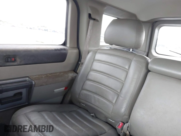 2003 Hummer H2 z VIN 5GRGN23U63H131139, wystawiony jako IAAI lot #42540561 z przebiegiem 182 365 mil mil oraz . Historia ofert i sprzedaży dostępna na DreamBid. Obrazek 16.