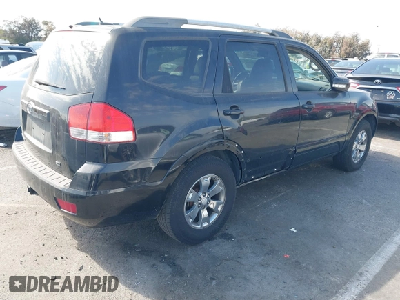 2009 Kia Borrego LX with VIN KNDJJ741095039023, listed as a IAAI auction lot 41696562 with 239,921 mi miles. Bid and sale history available at carsss.com. Image 4.